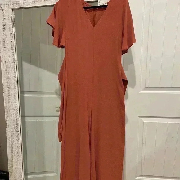 Pants - Ladies Rust colored romper. Very flowy fit & comfy Ties at waist